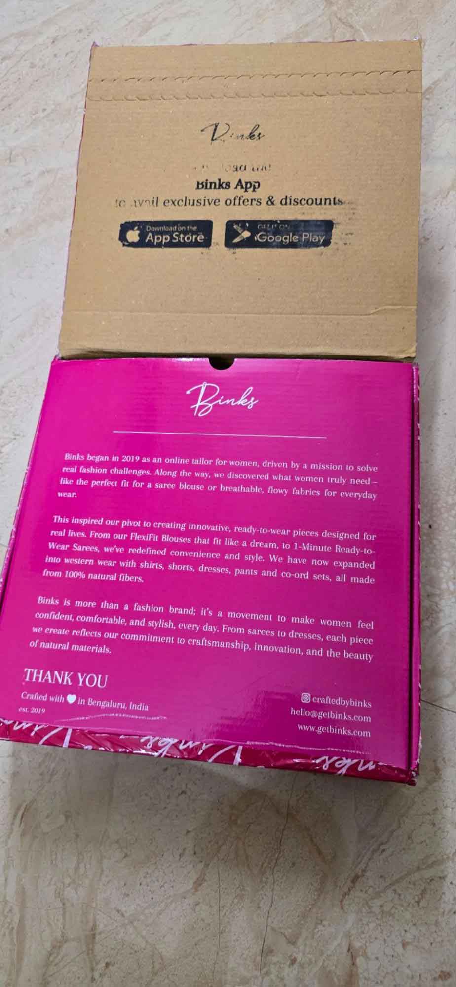 Pink colored Binks branded box